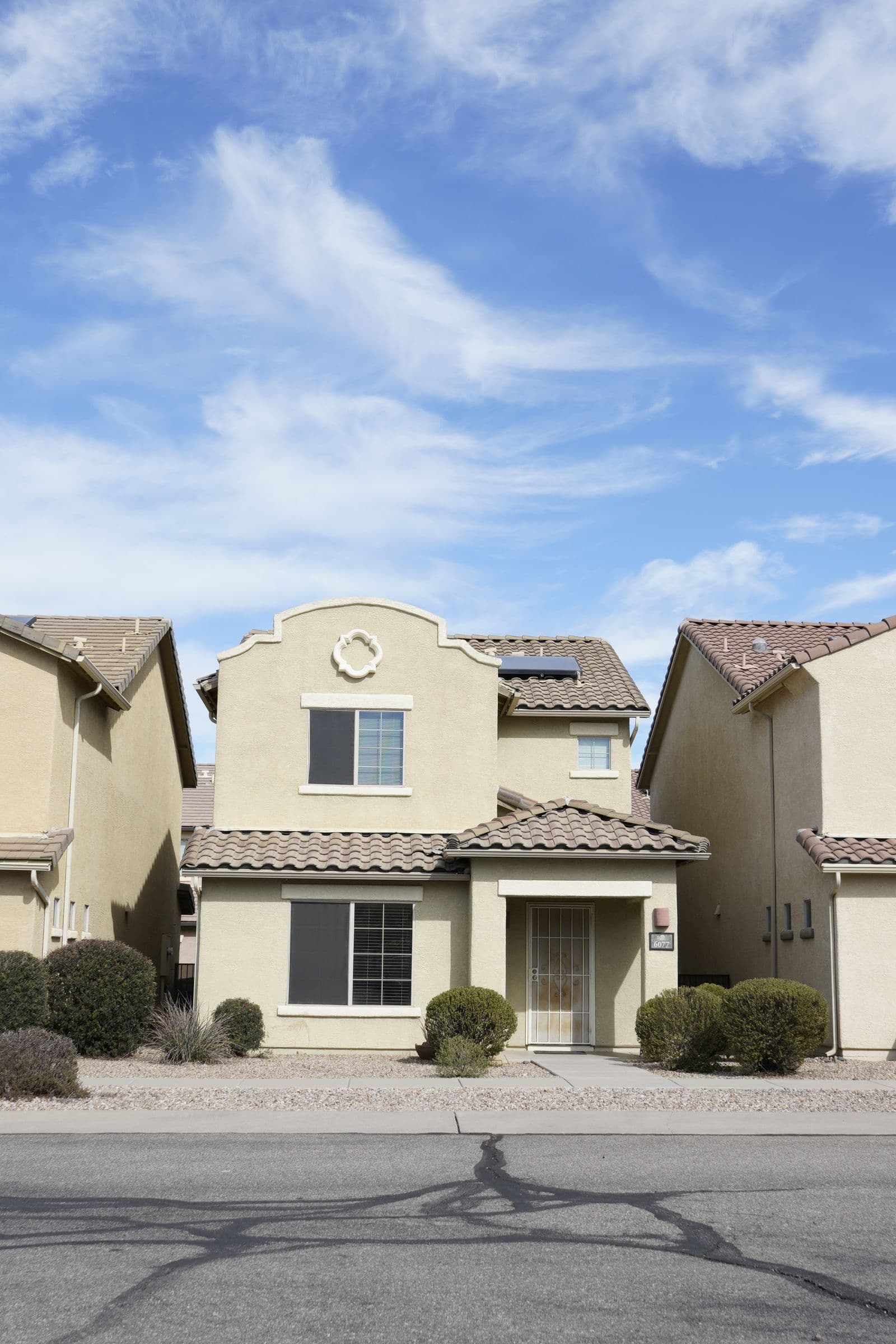 Stucco homes with tile roofs typical of the Vail area