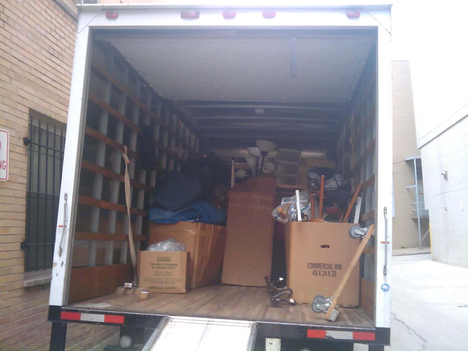 Moving truck loaded with packed boxes during a contents pack-out